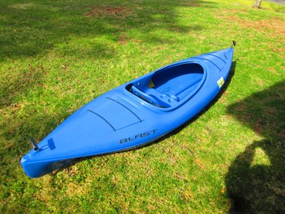 Exemplar blue plastic kayak