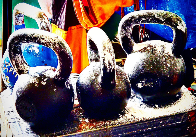 My chalked up 12kg, 16kg, 20kg, 24kg kettlebells