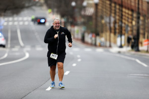 Chris Abraham finishing the 2016 Four Courts Four Miler