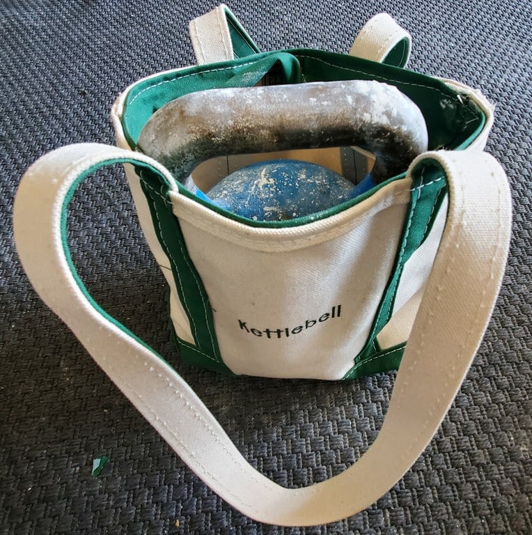 12kg kettlebell in a small LLBean canvas tote bag
