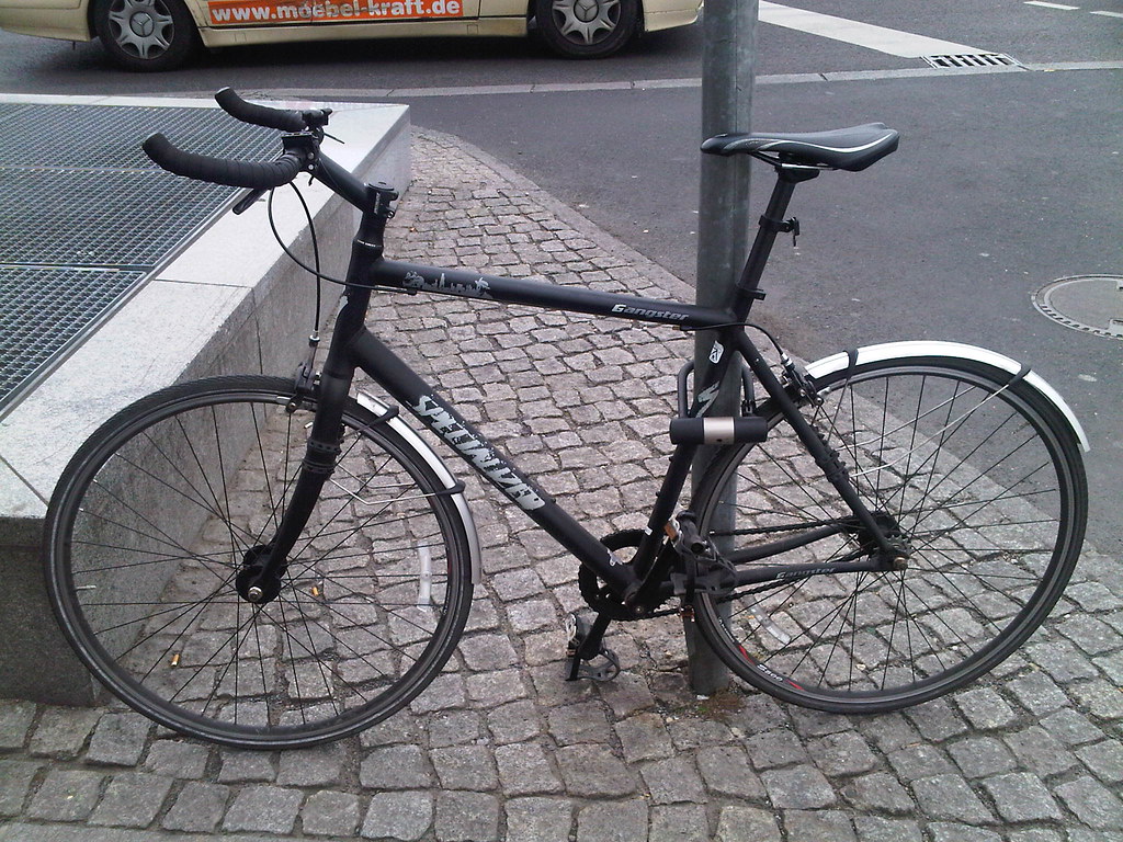 Here's my Specialized Langster Gangster single speed bike locked at a pole with the biggest, stoutest, U-lock I could buy. I wasn't that worries about stolen wheels as it didn't have quick release hubs or a quick release on the saddle. So, I would just secure the frame