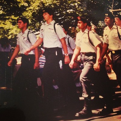 Chris Abraham in a parade with the Saint Louis School JROTC