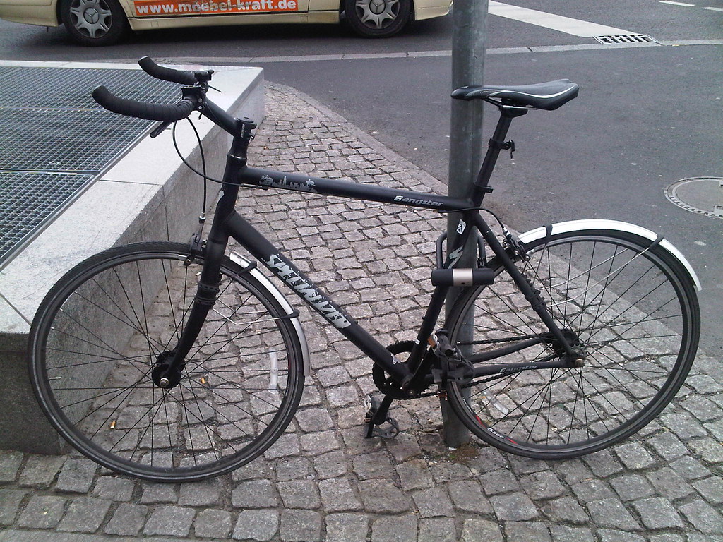 Here's my Specialized Langster Gangster single speed bike locked at a pole with the biggest, stoutest, U-lock I could buy. I wasn't that worries about stolen wheels as it didn't have quick release hubs or a quick release on the saddle. So, I would just secure the frame.