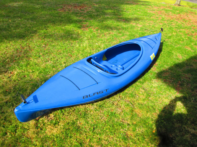 Blue plastic kayaks
